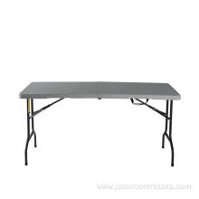White plastic fold up tables